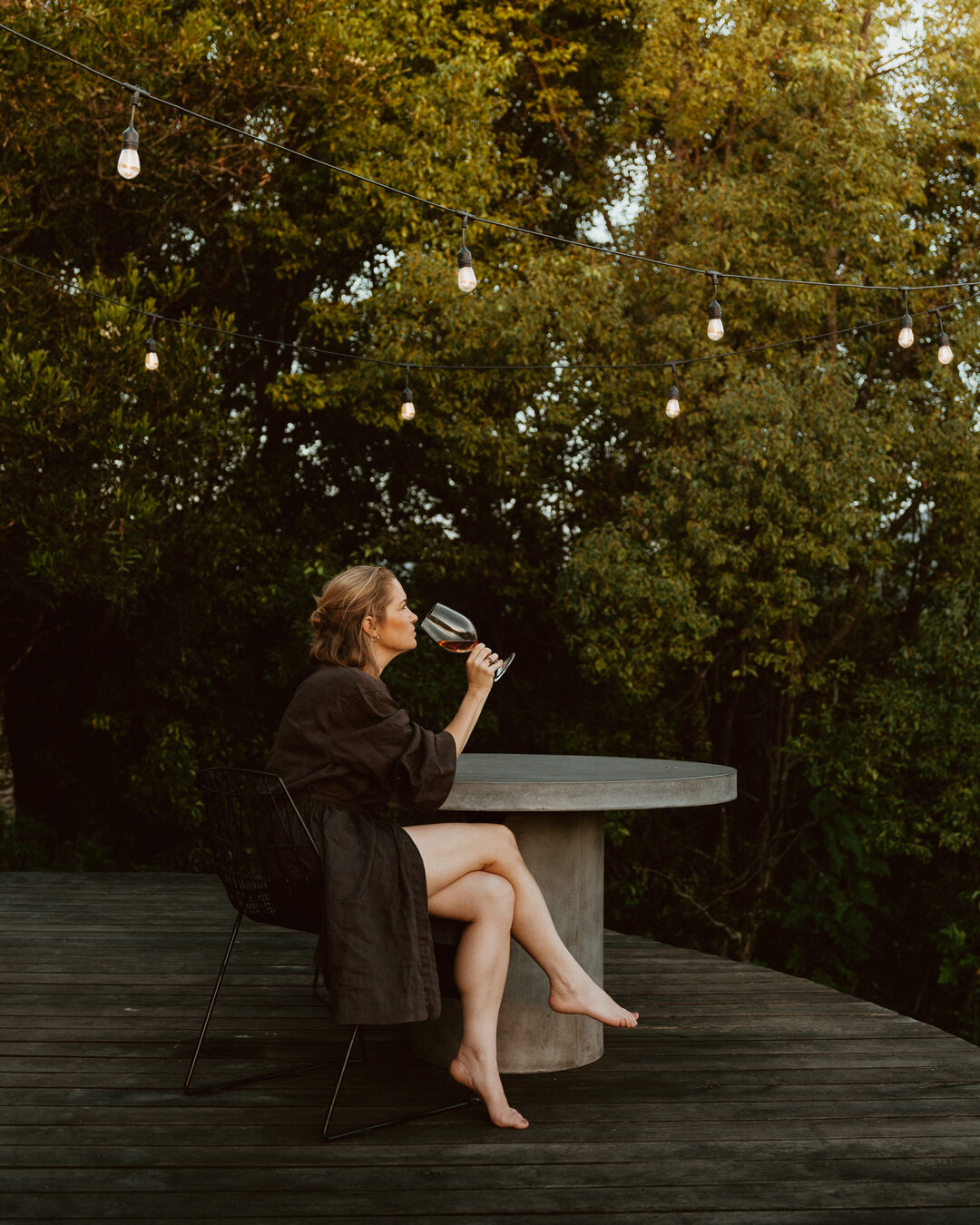Festoon lights, an @inbedstore linen bathrobe, and yum minibar wine. Iconic 🍷
 #rusticluxury #farmgetaway #ruralescape #farmstay #weekendsaway #luxuryescapes #cabinweekend #cabinlifestyle #tourismnsw #northernrivers #travelaustralia #visitnimbin